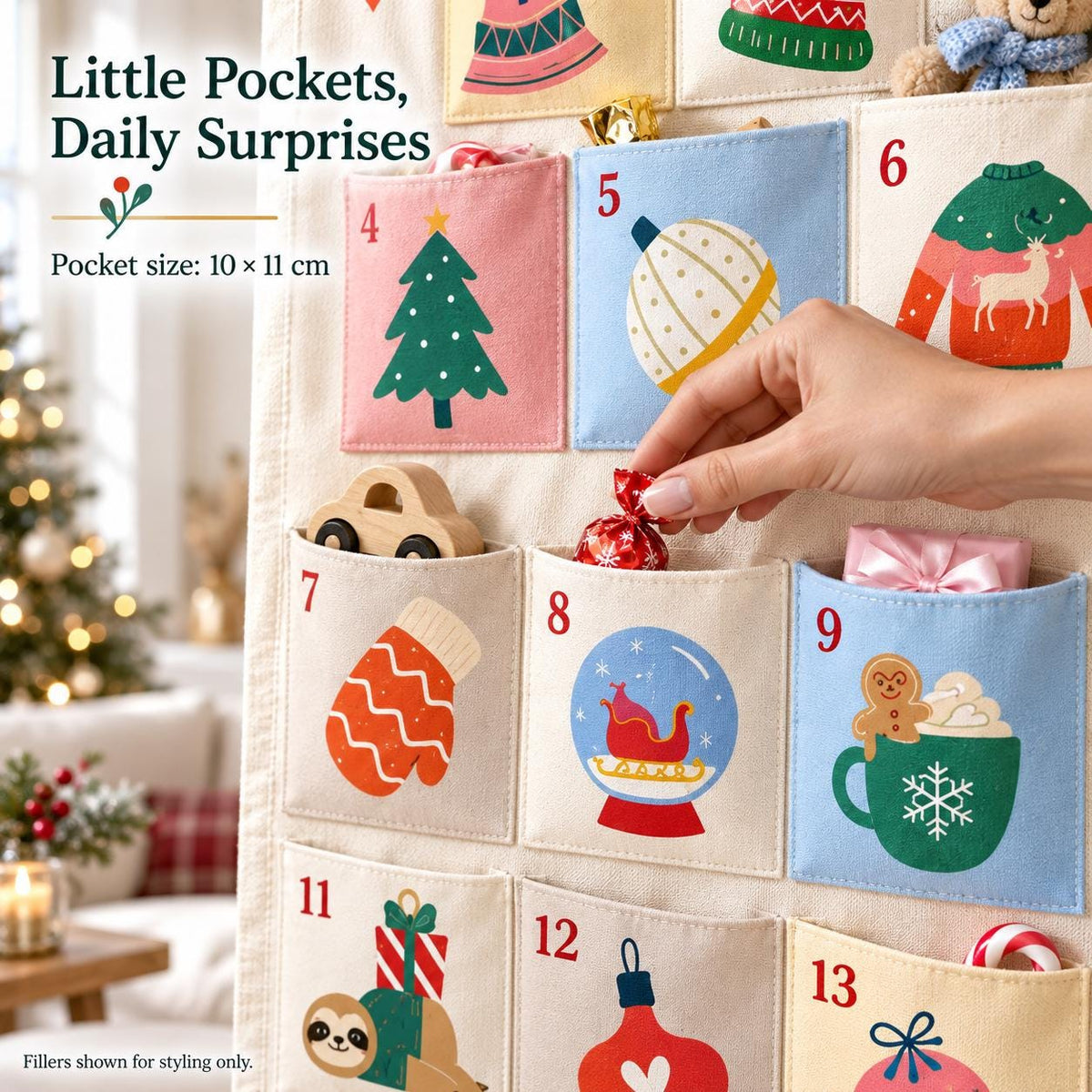 May include: A fabric advent calendar with numbered pockets featuring colorful holiday illustrations including a Christmas tree, snow globe, and gingerbread man. The text reads Little Pockets, Daily Surprises. Each pocket measures 10 x 11 cm.