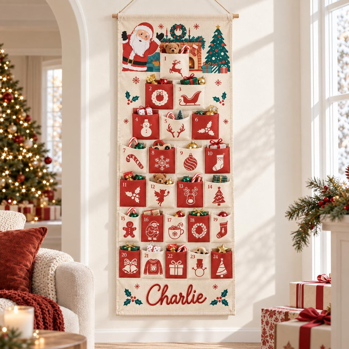 May include: A vertical fabric Christmas advent calendar hanging on a wall, featuring twenty-four numbered pockets in red and cream. The design includes illustrations of Santa, a tree, and holiday icons. The name Charlie is printed at the bottom.